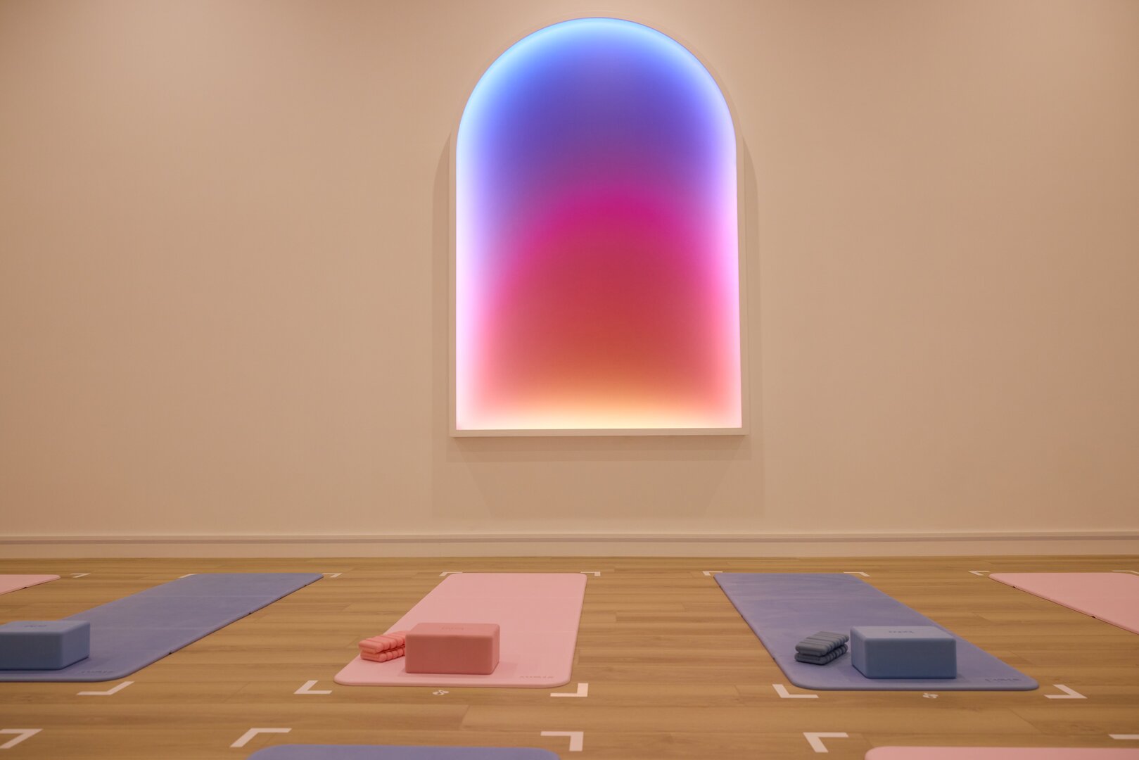 Portal Pilates studio with signature gradient arch window